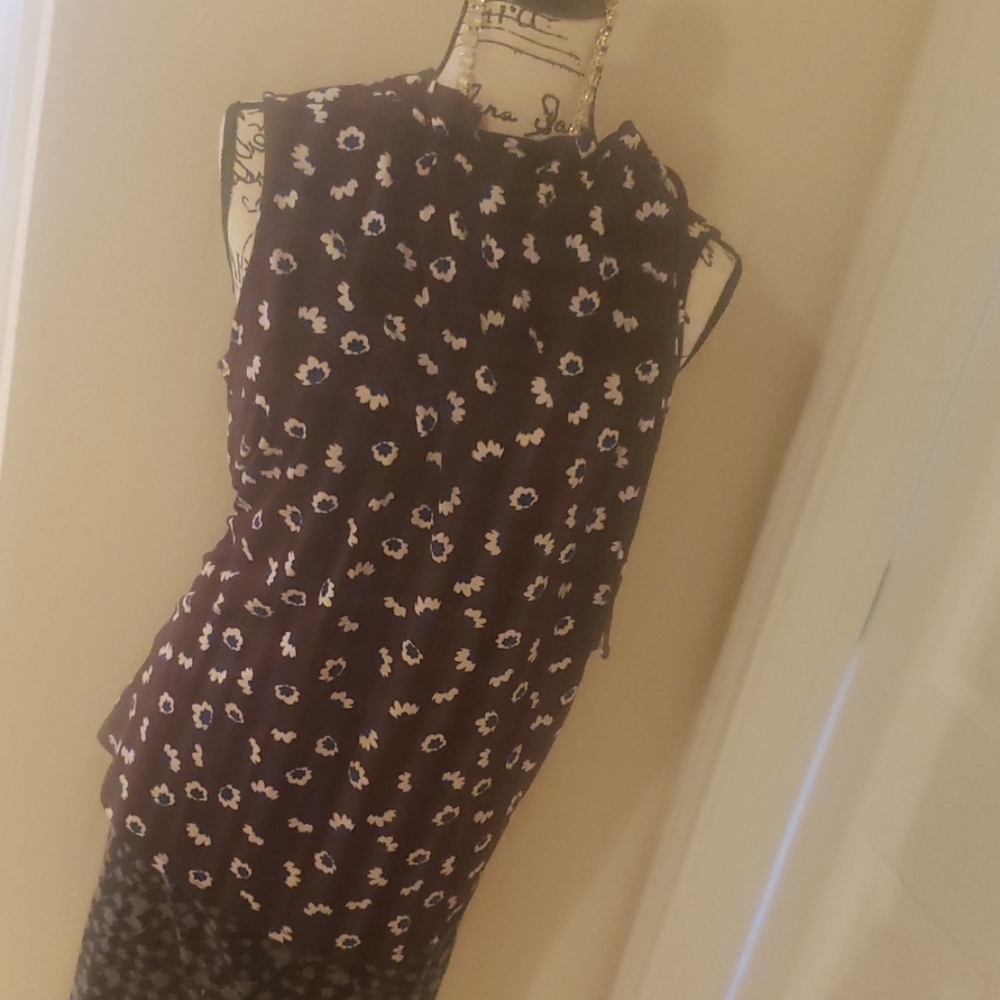 Sleeveless blouse. tall size
